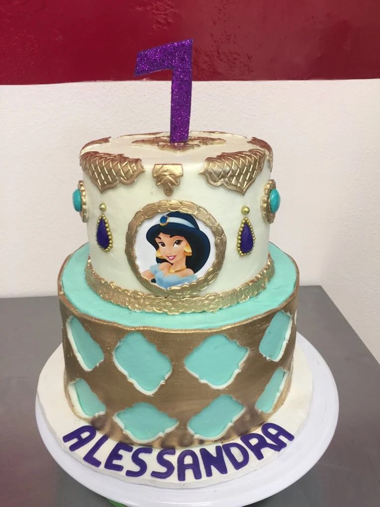 Gold and teal themed cake